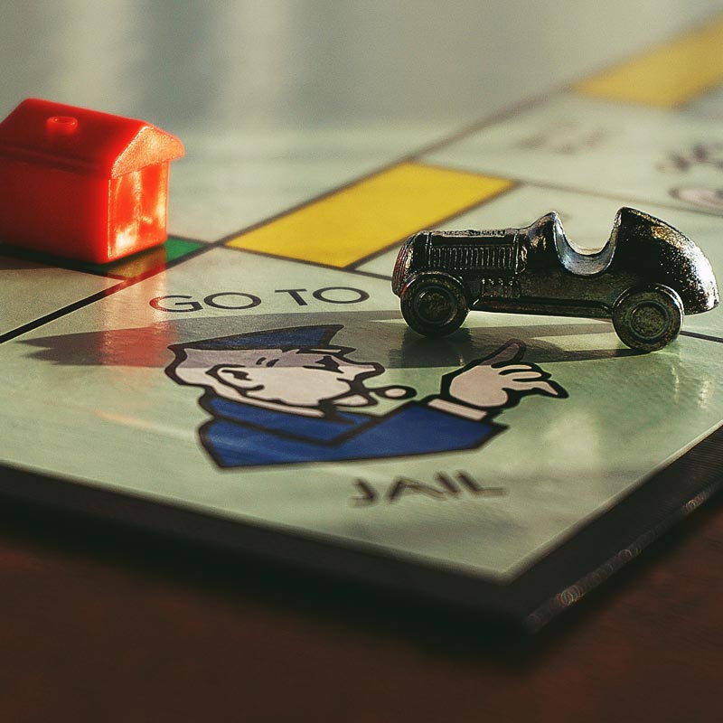 monopoly with car on go to jail square